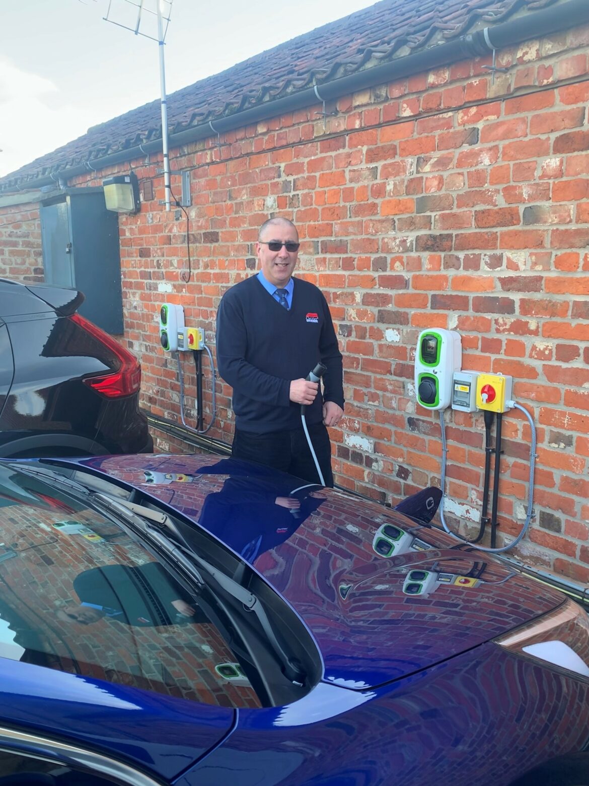 Richard Stringer charging his new electric car Kai E-NIRO
